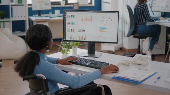 Pralyzed Woman Checking Graphics From Computer