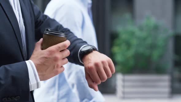 Confident Businessman Walking Hold Coffee Downtown