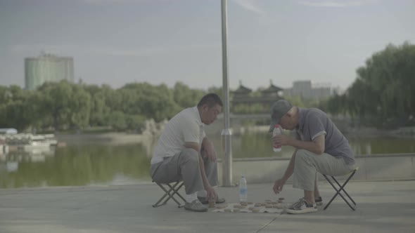 People Play the National Chinese Game. Beijing. China.