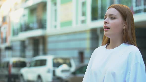 Teenage Girl Starting to Cough Trying to Inhale, Contaminated Air, Pollution