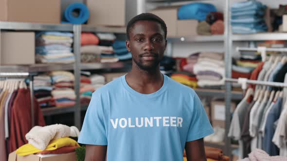 Portrait View of the Multiracial Man in Volunteer t Shirt Looking at the Camera with Smile