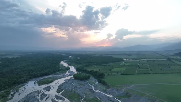 Flying over Alazani river at sunset. Kvareli, Georgia 2022 summer