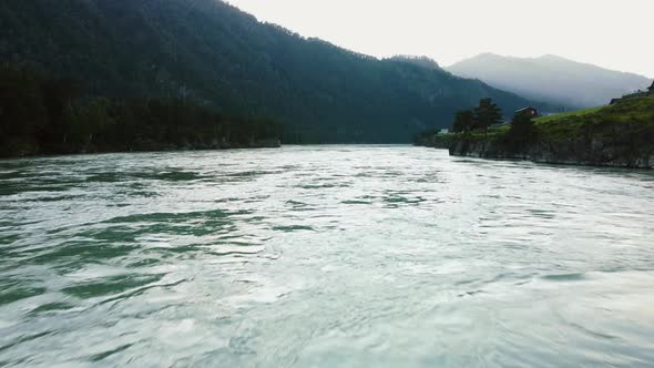 Aerial Photography Above the Surface of the Water in a Mountain Landscape