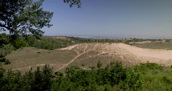 Sleeping Bear sand dunes scenic overlook in Michigan with left to right pan in slow motion.