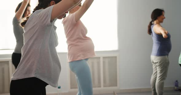 Yoga Class of Pregnant Women Practicing Fitness Enjoying Healthy Lifestyle