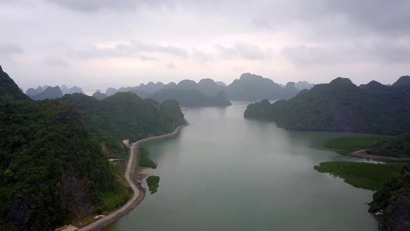 Cat Ba Island Vietnam with Gia Luan harbor road and an entrance of Lan Ha Bay in the north, Aerial f