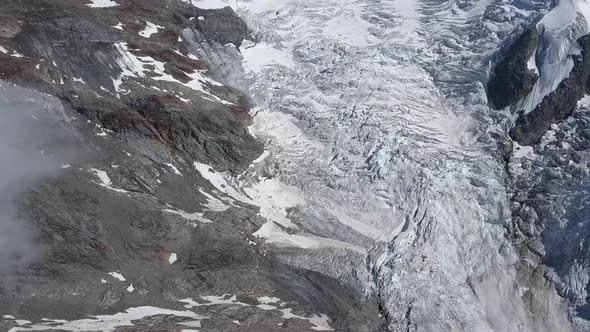 Panoramic aerial shoot of a glacier valley in the swiss alps in summer near Grindelwald