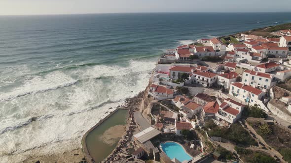 White houses tumbling down to the Atlantic, picturesque town of Azenhas do Mar, Sintra, Portugal