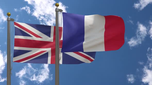 United Kingdom Flag Vs France Flag On Flagpole
