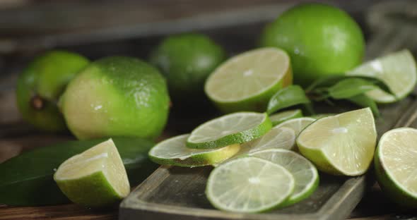 Sliced Lime on a Cutting Board Rotates Slowly. 
