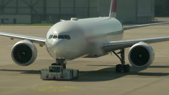 Modern Airplane Airliner Landing at Airport