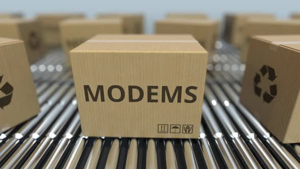 Carton Boxes with Modems on Roller Conveyors