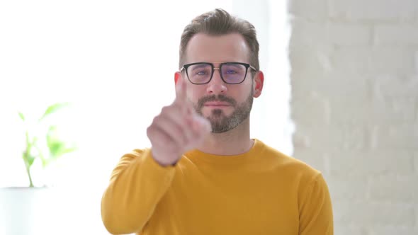 Portrait of Man Pointing at the Camera