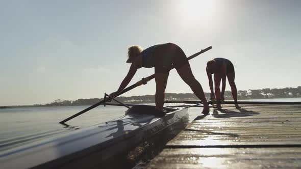 Female rowers training on a river