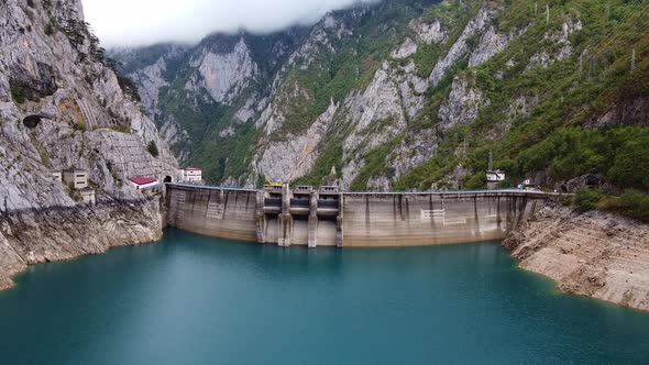 Drone View of Water Dam High in Mountains