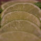Close Up Of Lime Slices, Zest, And Mint Panning Down - VideoHive Item for Sale