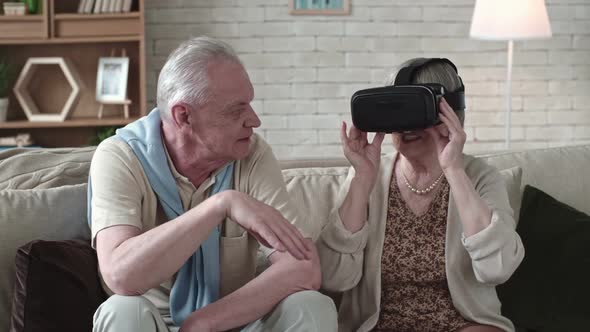 Laughing Elderly Woman in VR Headset