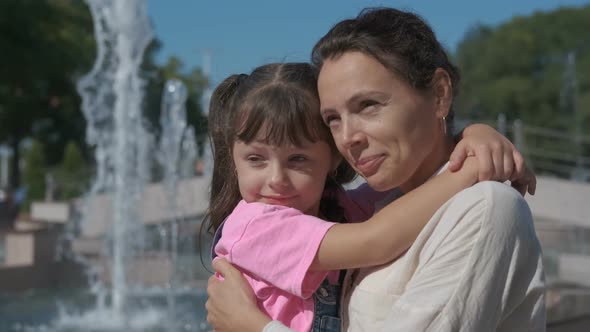 With Mother By Fountain