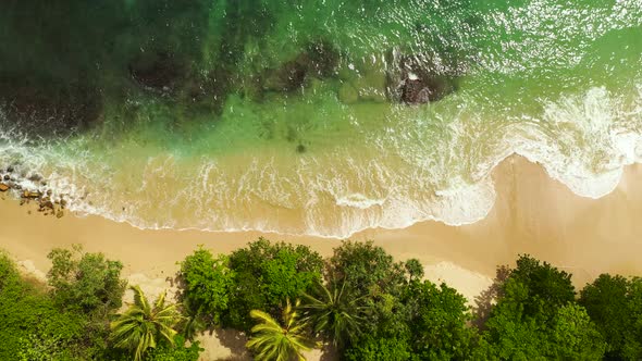 Sandy Beach with Ocean Surf and Waves