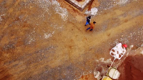 Couple walking near construction site