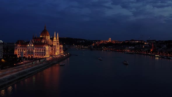 Aerial Drone View of Danube River and Budapest City Skyline at Night Time