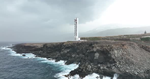 Lighthouse Look Out Tower Structure at Rocky Cliff Coast Atlantic Ocean Sea Line