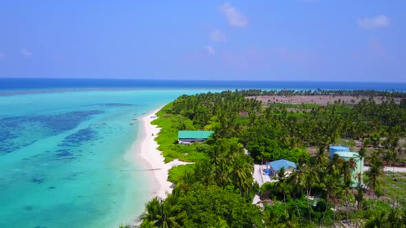 Aerial travel of resort beach by blue ocean and sand background