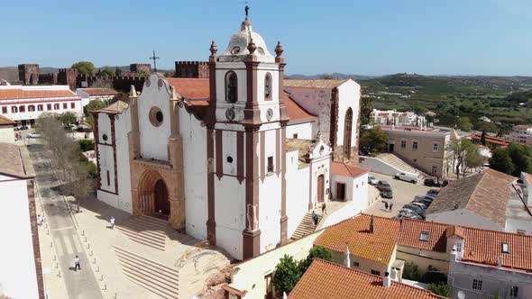 Aerial view of Silves Cathedral, Gothic architecture style, Algarve, Portugal. Orbit shot