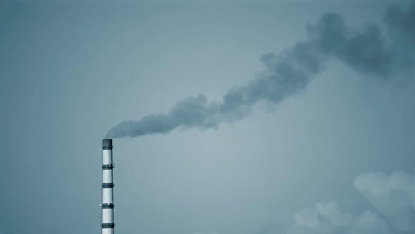 Large Pipe of Smoke Pipe Thermal Power Plant in Light on a Sunny Day