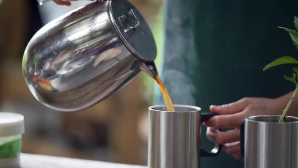 Slow motion coffee pour while camping.