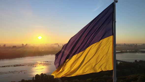 Ukrainian Flag in the Morning at Dawn. Aerial. Kyiv. Ukraine