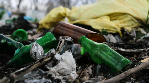 Ground Scattered Piles of Garbage