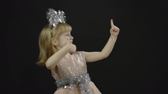 Happy Beautiful Little Baby Girl in Glossy Dress