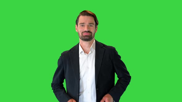 Businessman on the Run Smiling To Camera on a Green Screen Chroma Key