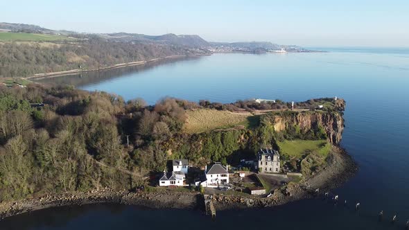 Sheer cliff aerial view near  Aberdour village, Fife, Scotland