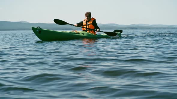 Skilful Kayaker on Blue Lake