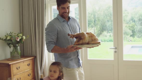 Three generation family eating together