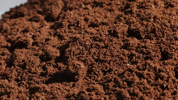 Close-up of ground Arabica coffee 4K slow pan video