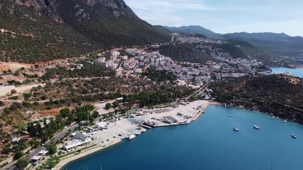 Aerial Drone View of Kas Town in Turkey Located on the Shoreline Next to the Harbor Bay