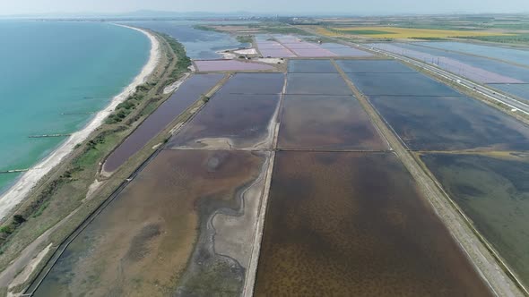 Amazing drone aerial landscape of the beautiful salt ponds, near the beach