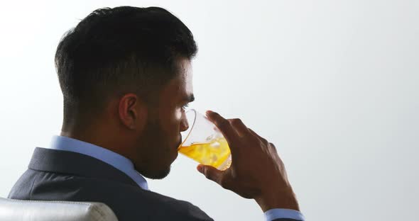 Businessman having juice