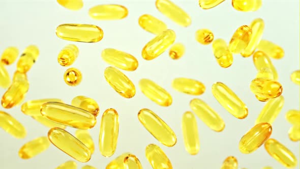 Omega 3 Vitamin Capsules Rotate Slowly in Flight