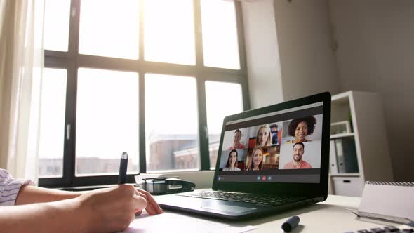 Woman with Laptop Having Video Call at Office