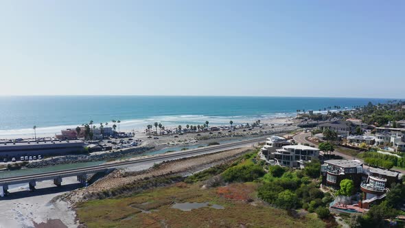 Aerial landscape shot of a beach on the West Coast of America. California drone shot