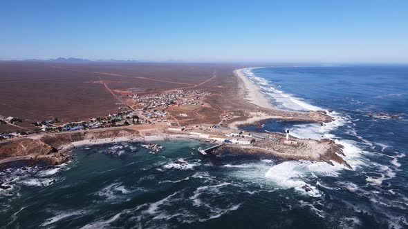 High aerial pan shows quaint Doringbaai on South African west coast