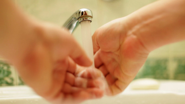 Washing Hands Under Running Water  alt