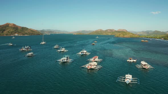 Tourist Boats in a Bay with Blue Water. Philippines, Palawan