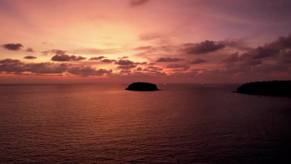 Orange Sunset with a View of the Sea and Island