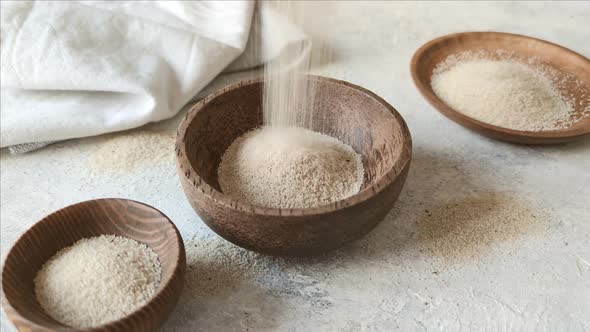 Raw uncooked fonio seeds in a bowl