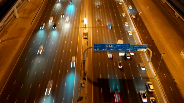 Aerial hyperlapse of a busy highway in Dubai at night, U.A.E.